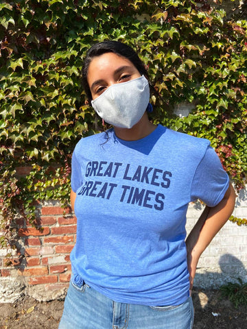 woman wearing a light blue great lakes great times shirt