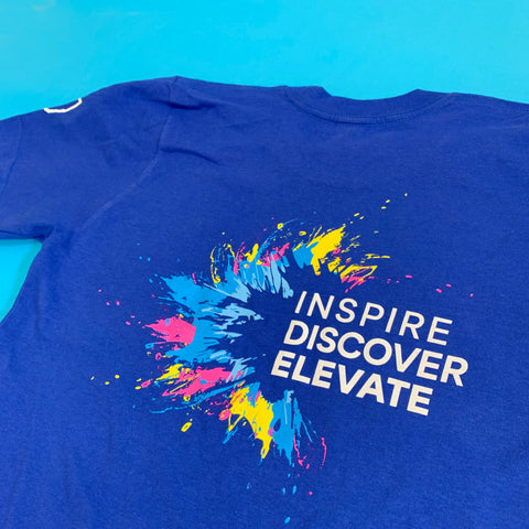 blue shirt with inspire discover elevate on it