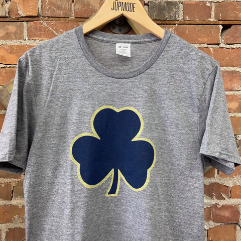 t-shirt with a blue and gold shamrock