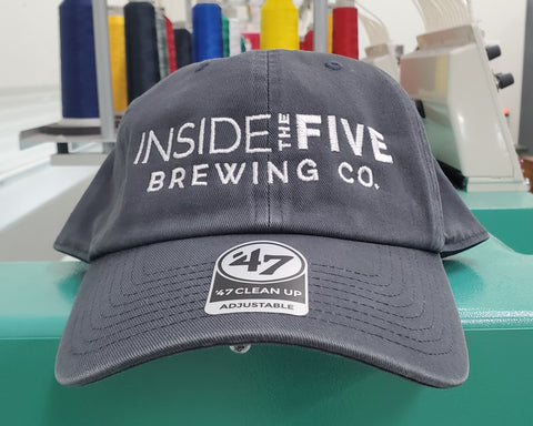 inside the five brewery dad hats