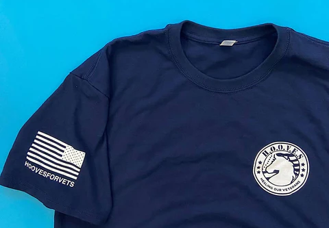 t-shirt with the American flag on the sleeve