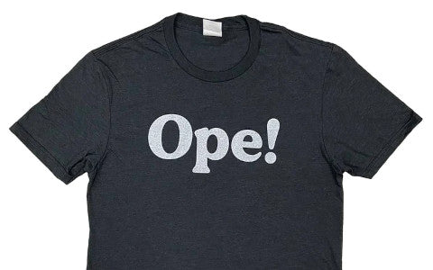 Ope, meaning “oops” on a black and white unisex shirt from fancysweetstx