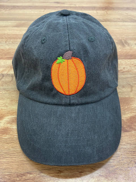 denim hat with a pumpkin embroidery