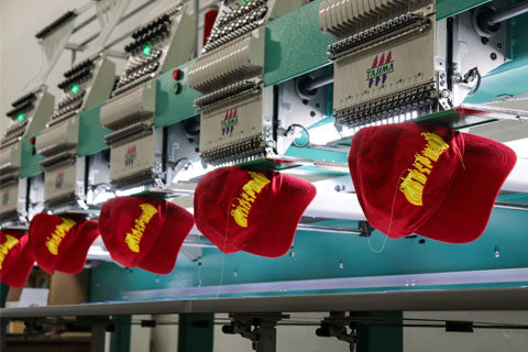 red hats branded through embroidery