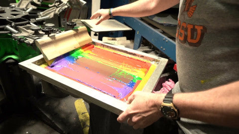 screen printing a rainbow on a t-shirt