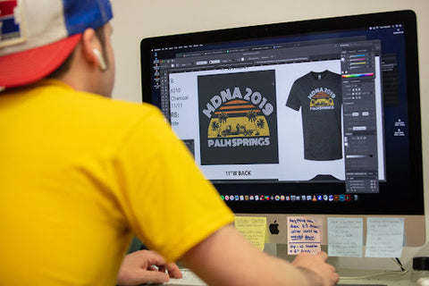 employee perfecting a t-shirt design